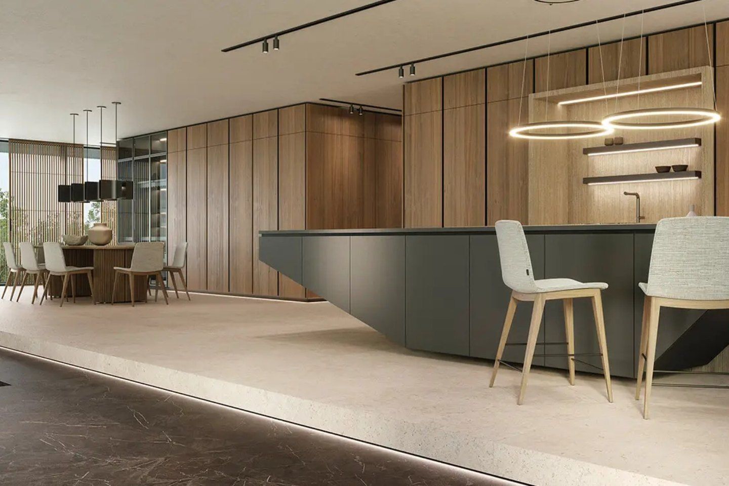 Kitchen with a dark island, wood-panel walls and ring pendant lights