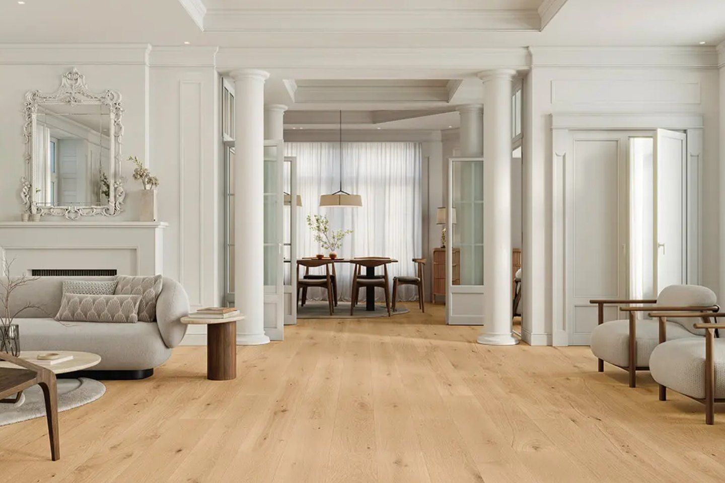Bright living room with white columns over a light oak plank floor
