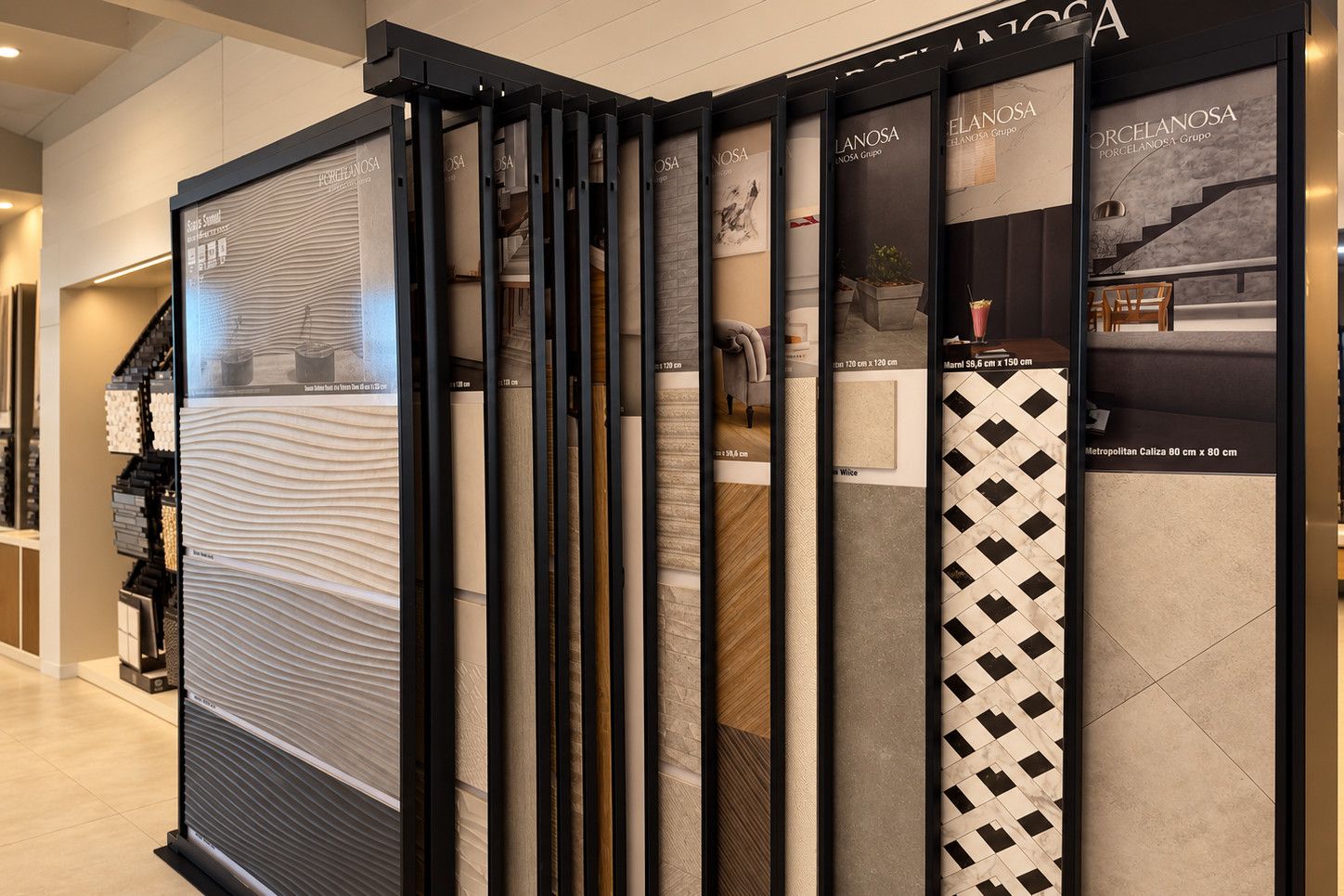 Porcelanosa's tile rack in our Sarasota showroom: big panels of its wall and floor tile, each under the Porcelanosa name