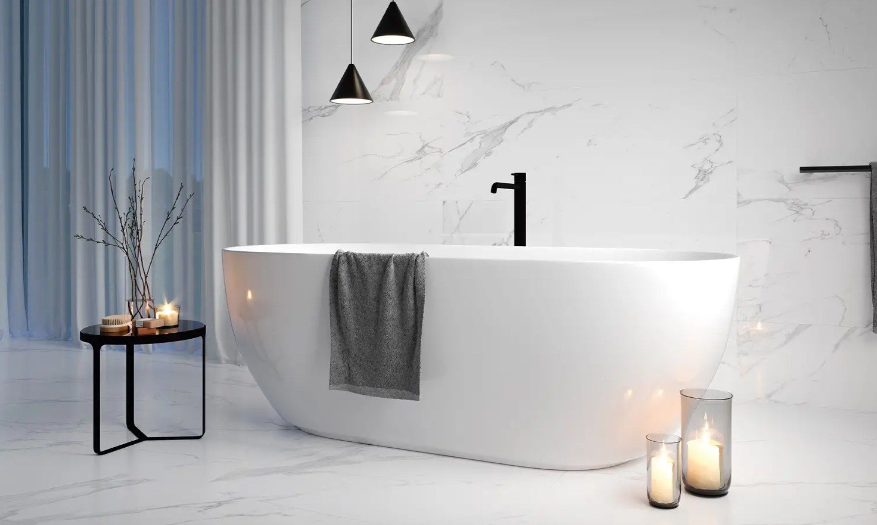 White marble-look bathroom with a freestanding tub and black fixtures
